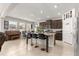 Spacious kitchen with island seating, tile floors, and stainless steel appliances at 8142 Sw 59Th Ave, Ocala, FL 34476