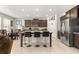 Open kitchen with granite countertops, island seating, stainless steel appliances and tile floor at 8142 Sw 59Th Ave, Ocala, FL 34476