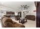 Spacious living area flowing from an open kitchen with comfortable seating and tile flooring at 8142 Sw 59Th Ave, Ocala, FL 34476