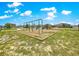 Community playground with swings and climbing structures, perfect for outdoor play at 8142 Sw 59Th Ave, Ocala, FL 34476
