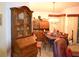 Traditional dining room featuring a large table, chandelier, and decorative furnishings at 8321 Sw 108Th Place Rd, Ocala, FL 34481
