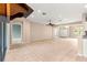 Open floor plan features tile flooring, neutral walls, and view to the front entry at 8961 Se 130Th Loop, Summerfield, FL 34491