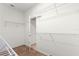 Spacious walk-in closet featuring wire shelving for optimal organization at 8961 Se 130Th Loop, Summerfield, FL 34491