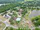 Aerial view displaying the community's various recreational facilities, including pools and lakes at 9 Bahia Trace Loop, Ocala, FL 34472