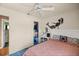 A cute bedroom features blue carpet and mermaid decals at 9 Bahia Trace Loop, Ocala, FL 34472