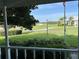 Scenic view from the porch overlooking lush green lawns and picturesque community landscape at 9622 Se 71St Ct, Ocala, FL 34472