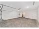 Spacious two-car garage with ample room for parking and storage with bright lights at 9865 Sw 105Th Ct, Ocala, FL 34481