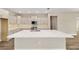Gourmet kitchen island features stainless sink, modern appliances, and stylish cabinets at 9865 Sw 105Th Ct, Ocala, FL 34481