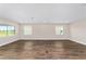 Bright living room with hardwood floors, recessed lighting, and plenty of natural light at 9865 Sw 105Th Ct, Ocala, FL 34481