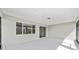 Relax on this covered patio with bright light and great views of the yard at 9865 Sw 105Th Ct, Ocala, FL 34481