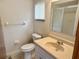 Standard bathroom with a vanity, toilet, and shower/tub combo, providing essential amenities at 11248 Sw 76Th Ter, Ocala, FL 34476