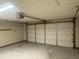 Spacious two-car garage with ample room for parking and storage at 11248 Sw 76Th Ter, Ocala, FL 34476