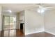 Bright living room with hardwood floors and sliding doors to the patio at 11248 Sw 76Th Ter, Ocala, FL 34476