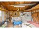The shed's interior is equipped with shelving and storage for tools and supplies at 12 Hemlock Radial Pass, Ocala, FL 34472