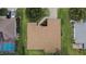 Aerial view of the well-maintained roof and landscaping of this charming single Gathering home at 13715 Se 88Th Ct, Summerfield, FL 34491