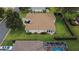 Overhead view displays the home, landscaping, driveway, and nearby homes at 13715 Se 88Th Ct, Summerfield, FL 34491