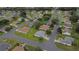 An aerial view of the home nestled in a tranquil neighborhood with manicured lawns at 13715 Se 88Th Ct, Summerfield, FL 34491
