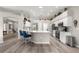 Spacious kitchen with island seating, stainless appliances, and a bright, open layout at 13715 Se 88Th Ct, Summerfield, FL 34491