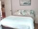Cozy bedroom with a nautical-themed decor and a comfortable, inviting bed at 14192 Sw 112Th Cir, Dunnellon, FL 34432