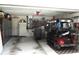 Spacious garage featuring a golf cart, and ample storage space at 14192 Sw 112Th Cir, Dunnellon, FL 34432