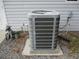 Exterior HVAC unit adjacent to a home at 14192 Sw 112Th Cir, Dunnellon, FL 34432