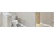 Clean bathroom featuring a toilet, tile flooring, and neutral walls at 145 Harbor Way, Auburndale, FL 33823