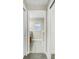 Hallway offers access to an adjacent bathroom at 145 Harbor Way, Auburndale, FL 33823