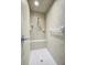 Tiled walk-in shower features a built in bench and multiple shower heads at 145 Harbor Way, Auburndale, FL 33823