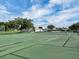 Spacious community tennis court ready for a match at 145 Harbor Way, Auburndale, FL 33823