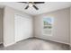 Bedroom features closet, window, and modern flooring at 17277 Sw 44Th Cir, Ocala, FL 34473