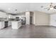 Open concept kitchen and living room area, featuring modern stainless steel appliances and countertops at 17277 Sw 44Th Cir, Ocala, FL 34473