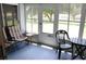 Relaxing screened lanai with comfortable seating for outdoor enjoyment at 17720 Se 115Th Ct, Summerfield, FL 34491