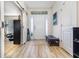 Bright entryway featuring wood floors, high ceilings, and ample natural light at 186 Nw 44Th St, Ocala, FL 34475