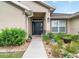 Close up of a home's front porch, showcasing the meticulously maintained landscaping at 186 Nw 44Th St, Ocala, FL 34475