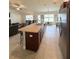 Open-concept kitchen with a large island, seamlessly connecting to the living area at 186 Nw 44Th St, Ocala, FL 34475