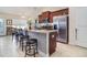 Beautiful kitchen with granite counters, island seating, and stainless appliances at 186 Nw 44Th St, Ocala, FL 34475