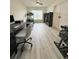 Inviting office space with natural light, complemented by a workspace and exercise area at 186 Nw 44Th St, Ocala, FL 34475