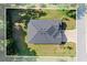 An aerial view displays a home's new roof, lawn, and layout within property boundary lines, ensuring optimal curb appeal at 19551 Sw 77Th Loop, Dunnellon, FL 34432
