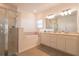 This bathroom features a tub, large shower, and double sink vanity at 19551 Sw 77Th Loop, Dunnellon, FL 34432