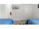 Bright bedroom featuring a cow print above the bed, wood-look floors and double closets at 19551 Sw 77Th Loop, Dunnellon, FL 34432