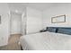 Bedroom featuring natural light, hardwood floors, a large closet and a sign that says 'Make Yourself at Home' at 19551 Sw 77Th Loop, Dunnellon, FL 34432