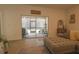 Living room with sliding door to screened lanai provides abundant natural light at 19551 Sw 77Th Loop, Dunnellon, FL 34432