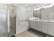 Main bathroom with double vanity, shower and soaking tub at 19551 Sw 77Th Loop, Dunnellon, FL 34432