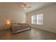 Comfortable main bedroom with soft colors, and natural light through the windows at 19551 Sw 77Th Loop, Dunnellon, FL 34432