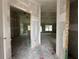 Spacious open-concept living area with large windows awaiting customization at 2 Pine Course Trl, Ocala, FL 34472