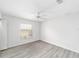 Bedroom with hardwood floors, natural light, and a ceiling fan at 2644 Sw 20 Cir, Ocala, FL 34471