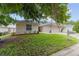 Well-maintained single-story home with landscaped front yard at 2644 Sw 20 Cir, Ocala, FL 34471