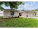 Charming single-story home with an attached garage and a freshly painted exterior at 2644 Sw 20 Cir, Ocala, FL 34471