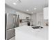 Modern kitchen featuring stainless steel appliances, quartz countertops, and white cabinets at 2644 Sw 20 Cir, Ocala, FL 34471