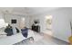 Main bedroom boasts a tray ceiling, neutral decor, and an en-suite bathroom at 2644 Sw 20 Cir, Ocala, FL 34471
